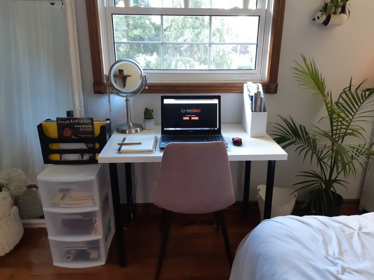 White organized desk with computer in bedroom